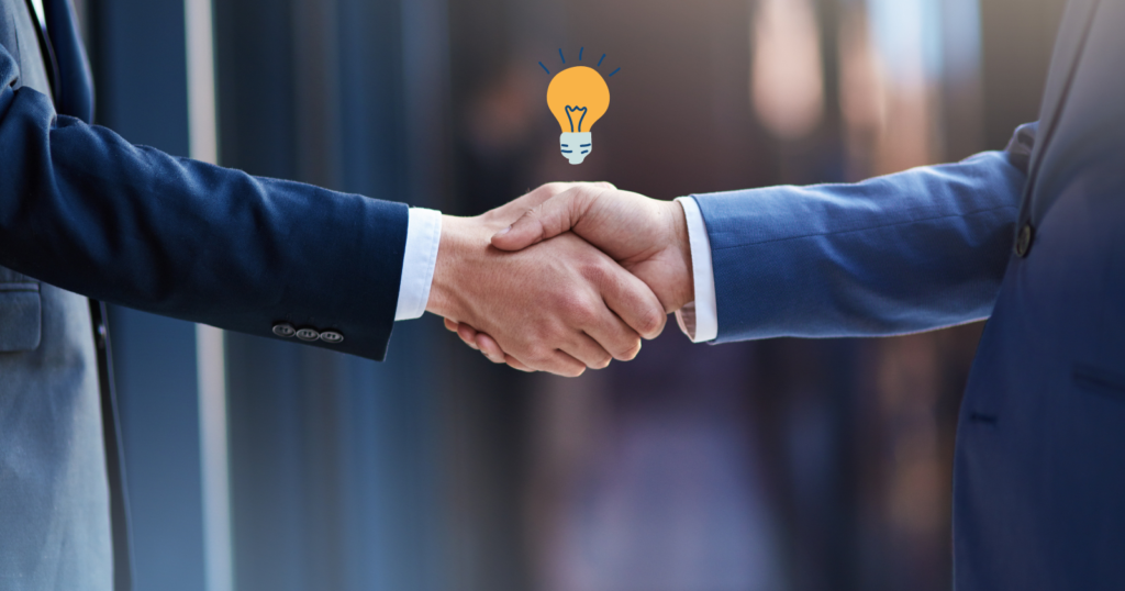 how to start a business with no money: 2 men shaking hands